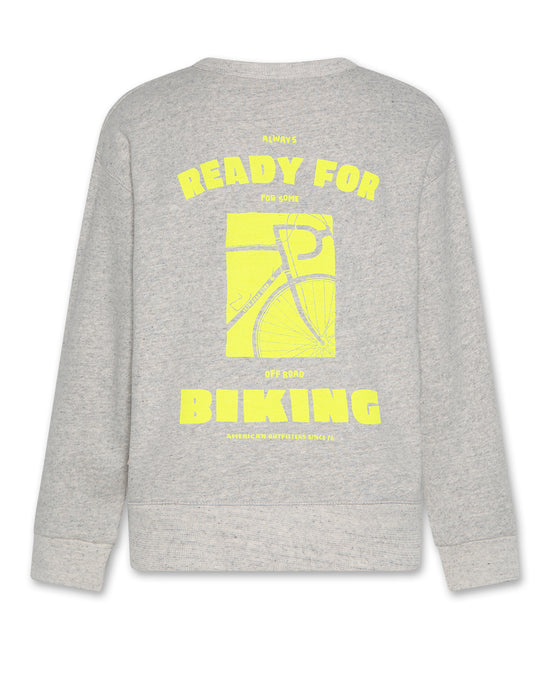 oscar sweater biking