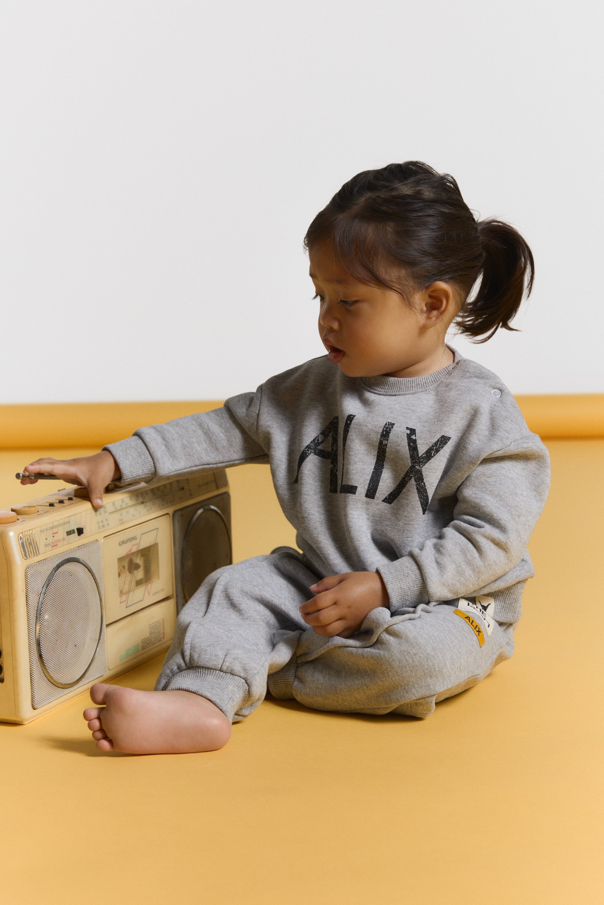 baby world tour sweater