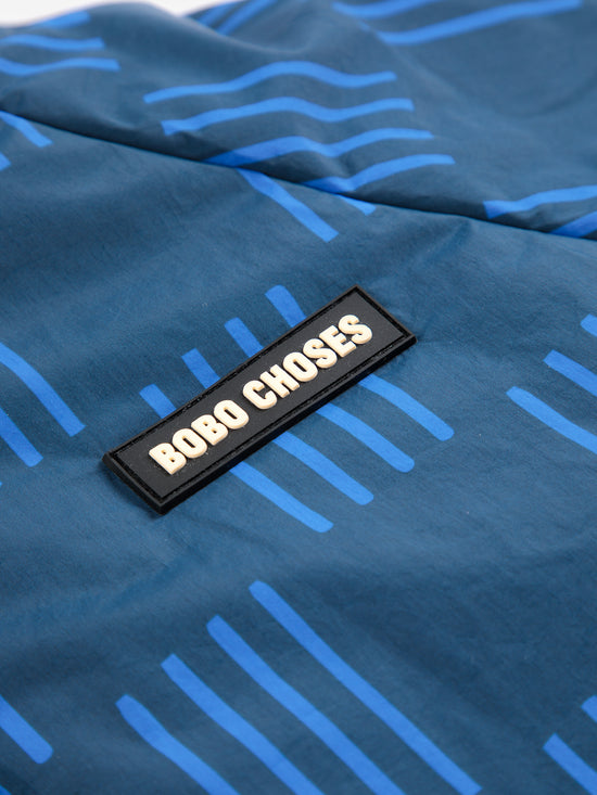 Almost Moiré all over reversible anorak